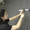 a demonstration with a woman installing the hangsmart tv mounting brackets